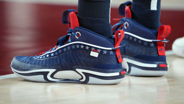 View of Jayson Tatum's red, white, and blue Air Jordan shoes worn in the 2020 Summer Olympics.
